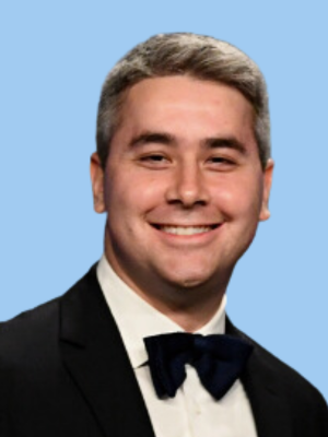 David Fogel Headshot (Blue Background)