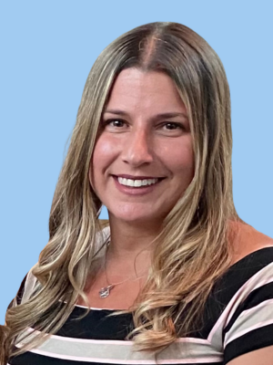 Karen Marrero Headshot (Blue Background)